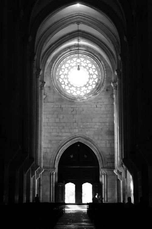 Free Monochrome view of a gothic cathedral interior showcasing architectural elegance in Fátima, Portugal. Stock Photo