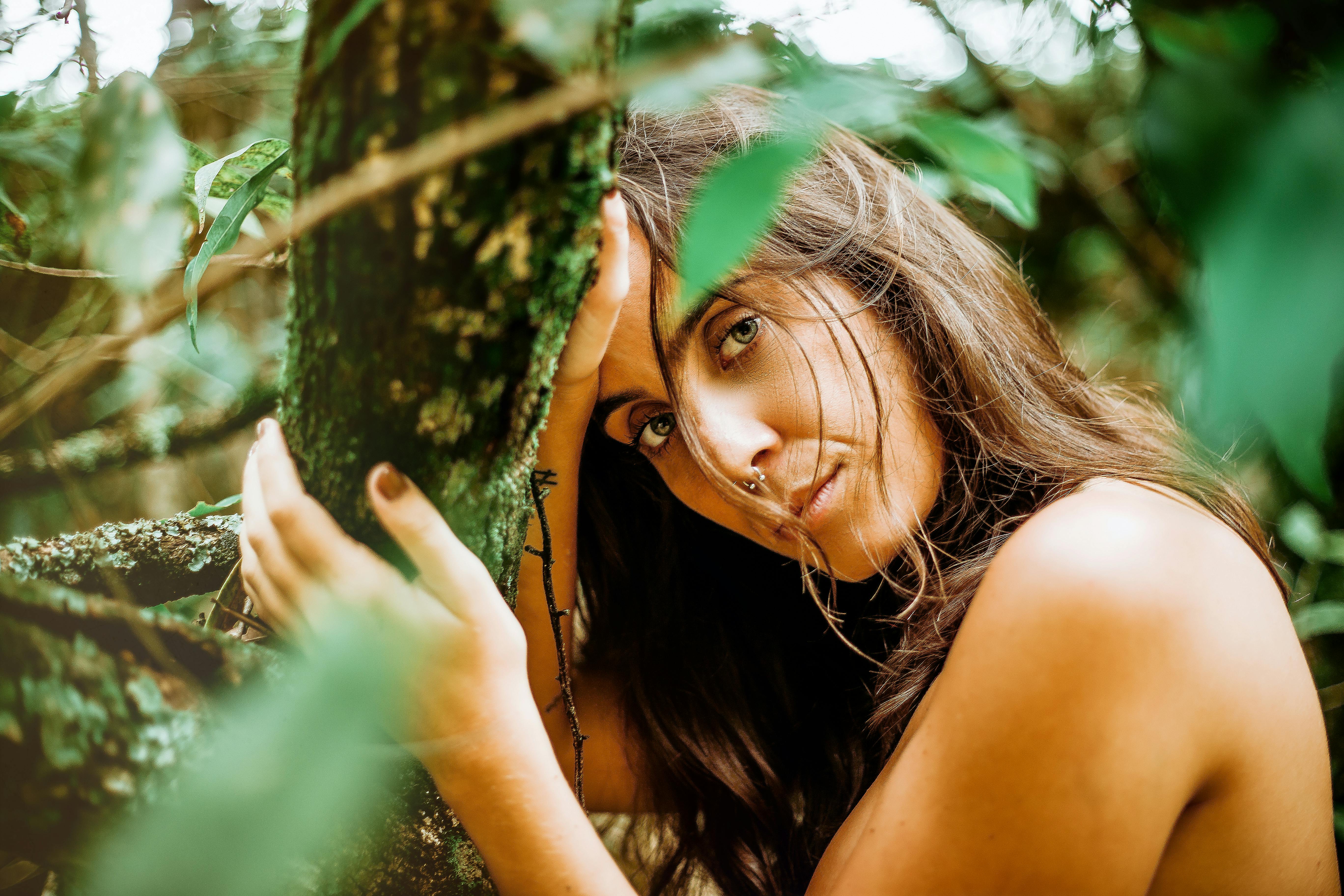 Naked Woman Holding Tree Branch · Free Stock Photo