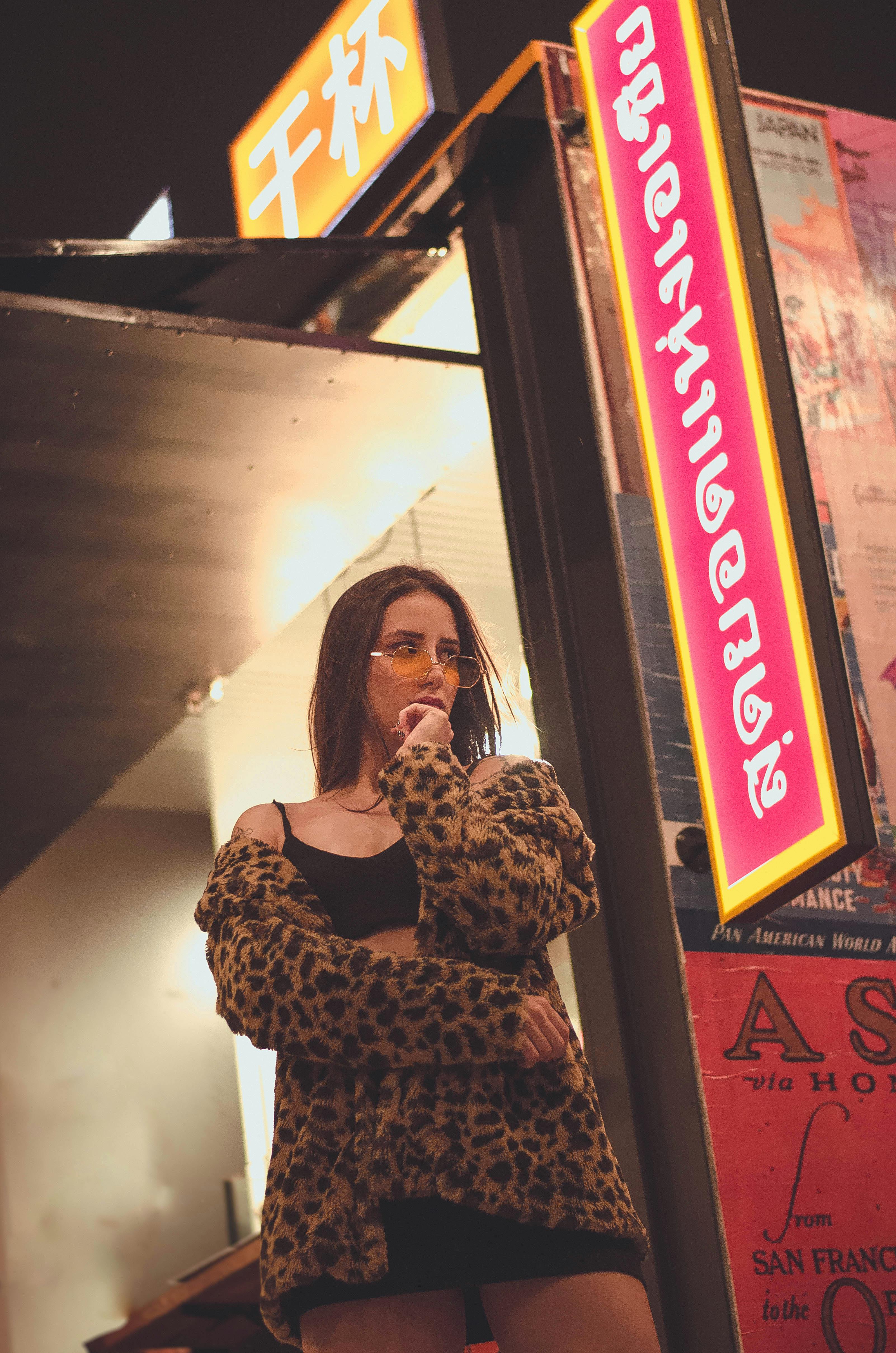 Woman Wearing Black and Brown Leopard-print Jacket · Free Stock Photo