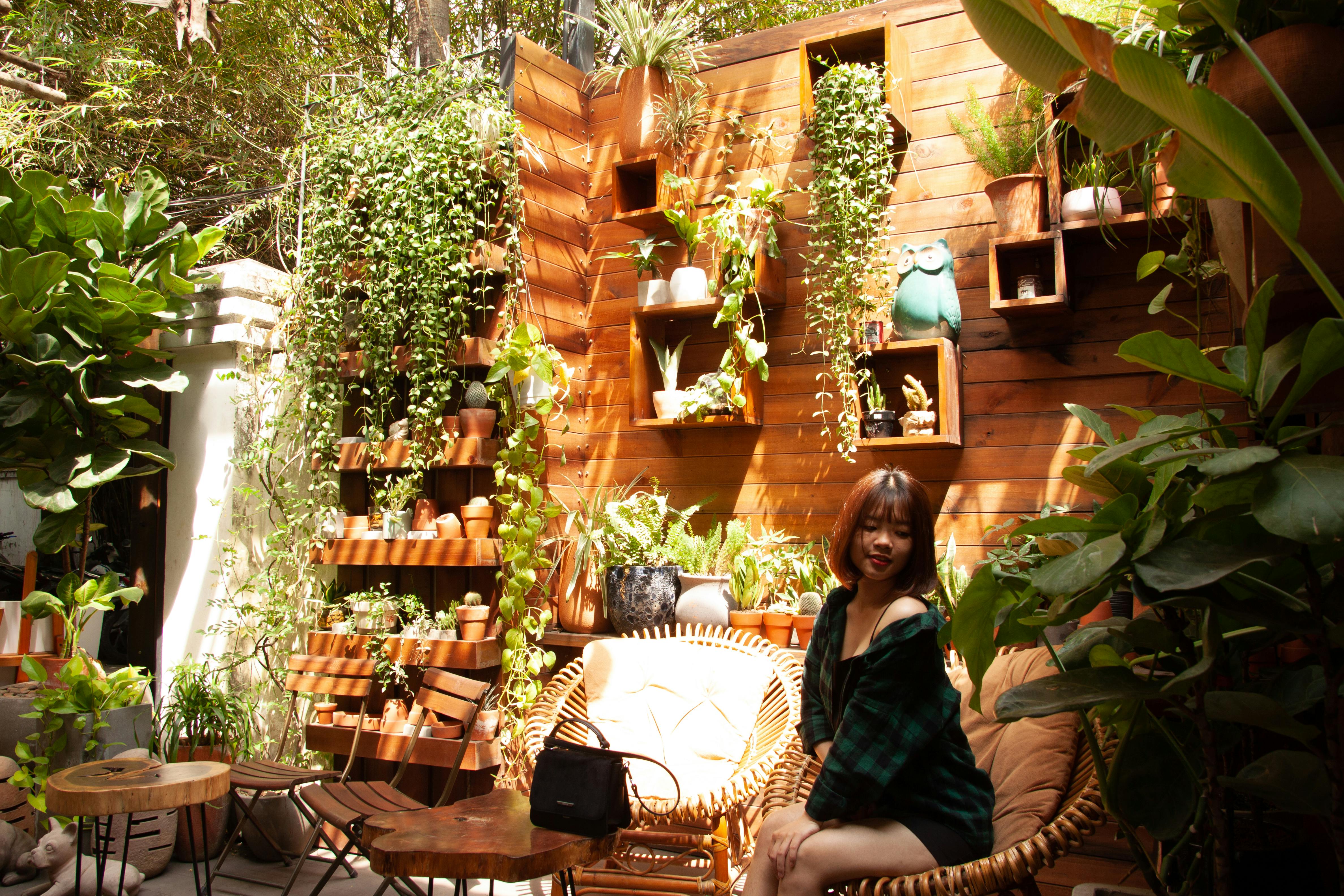 Woman Sitting on Sofa Chair