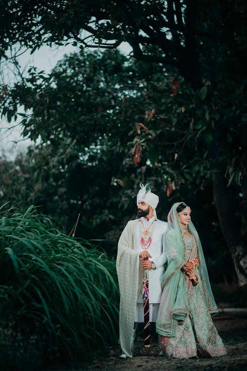 Man Standing Near Woman