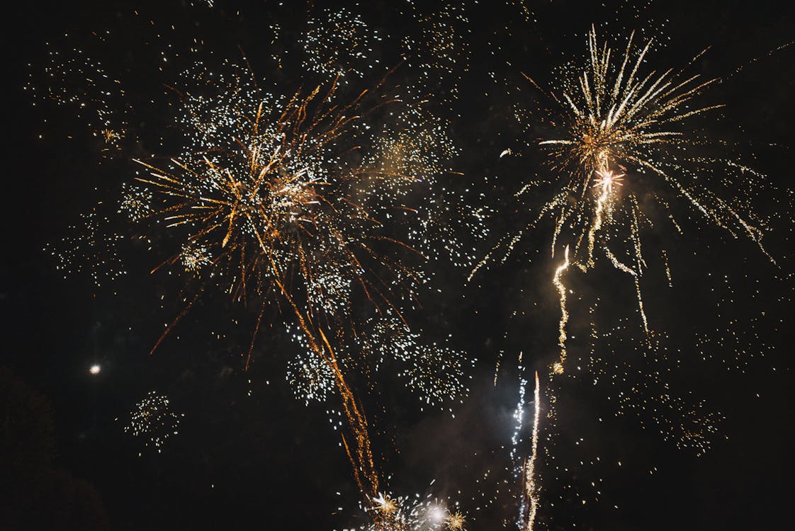 Fireworks in the night sky with a black background
