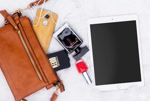 Silver Ipad on White Textile