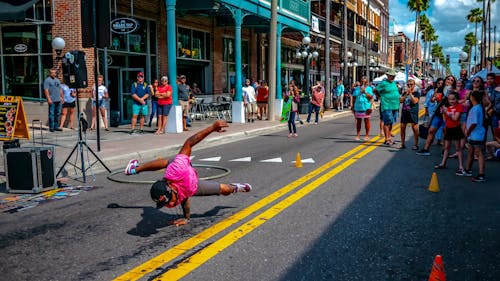 Man Doing Break Dancing Surrounded With People