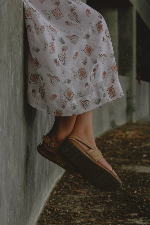 Person Wearing Brown Sandals