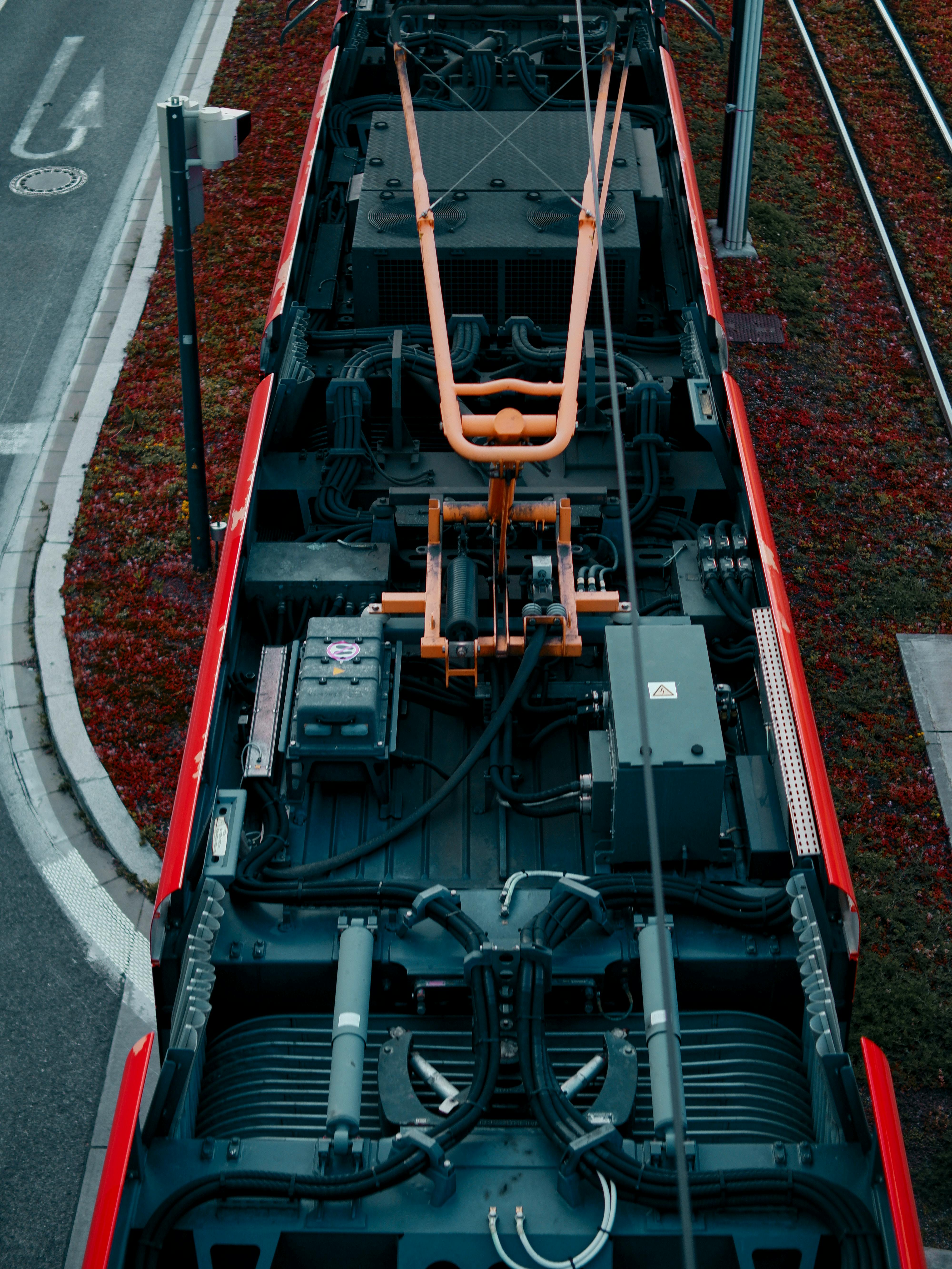 pantograph on top of red tram