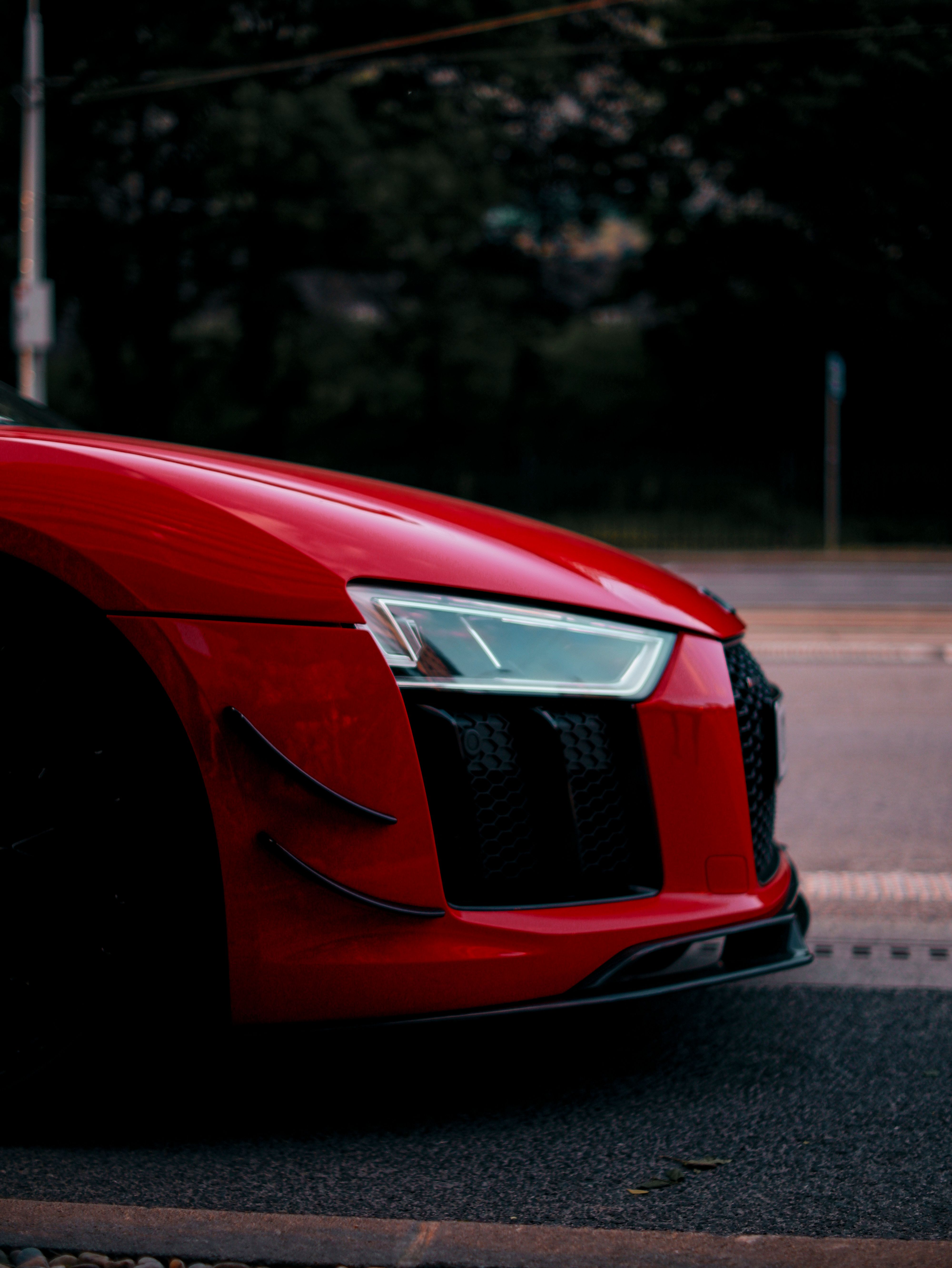 Headlight of Red Audi R8 · Free Stock Photo