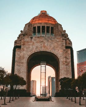 Stunning view of the Monument to the Revolution in Mexico City, captured at sunrise.
