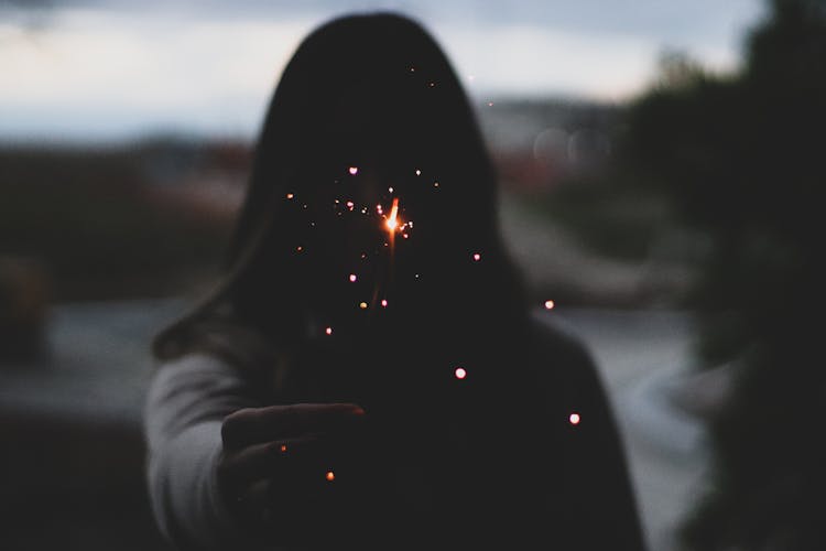 Woman Holding Sparkler