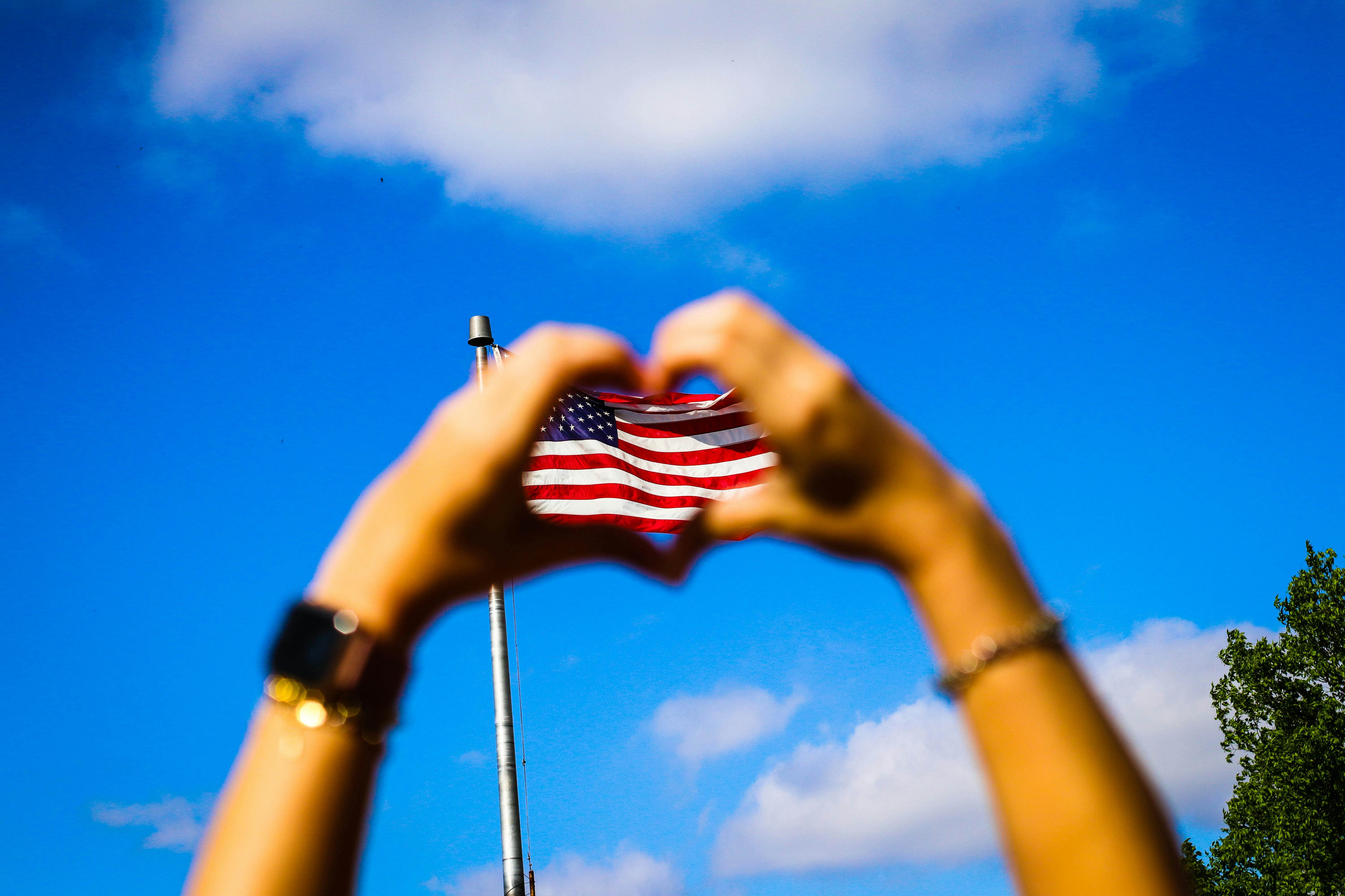 Human Hands And Us Flag Free Stock Photo