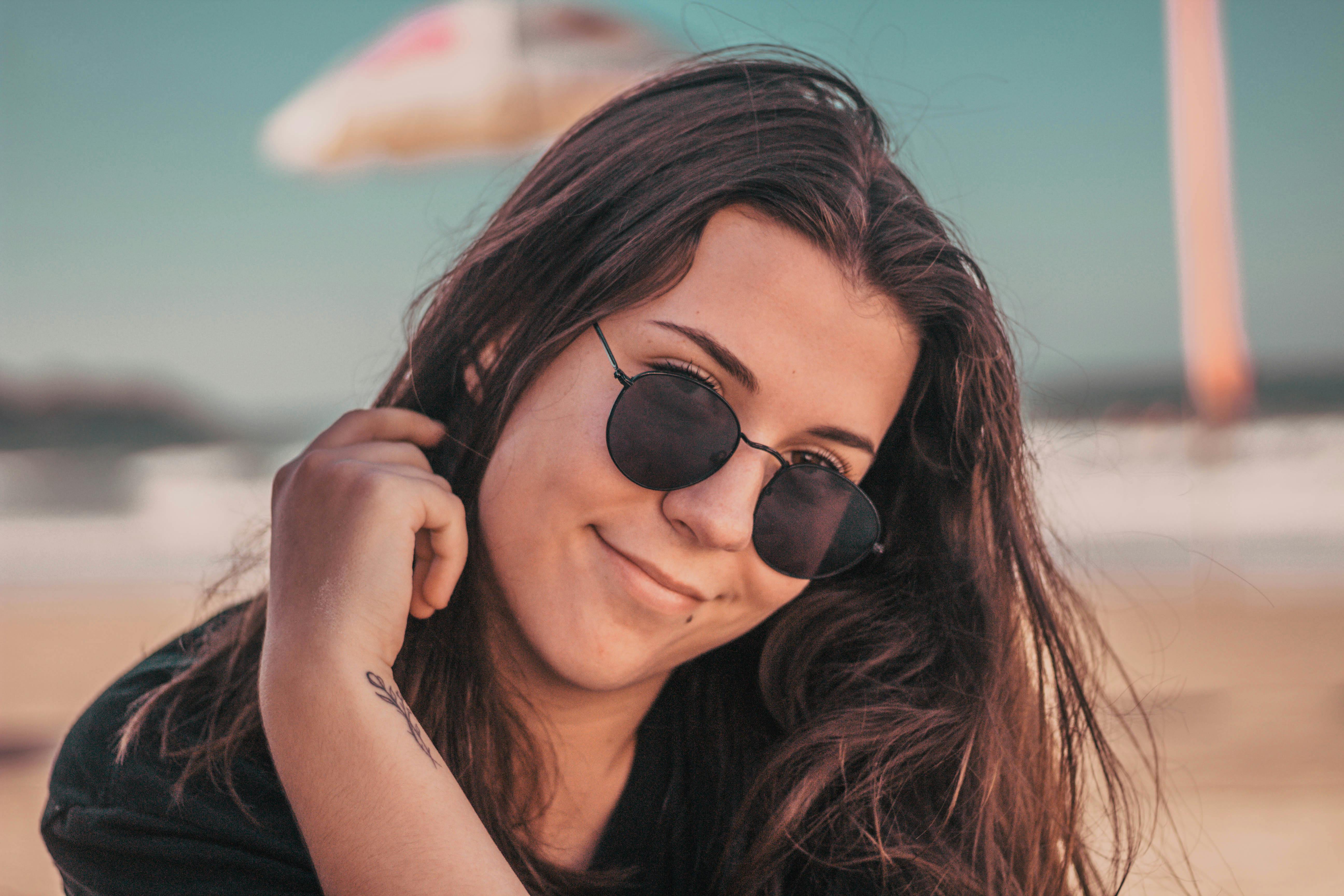 Portrait Of Woman Wearing Black Sunglasses · Free Stock Photo