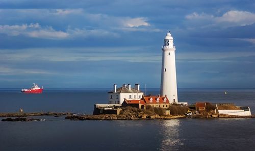Free Captivating view of St. Mary's Lighthouse standing majestically by the North Sea. Stock Photo