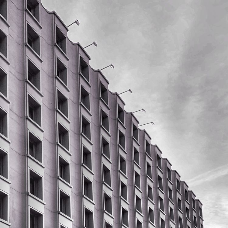 Concrete High-rise Building · Free Stock Photo