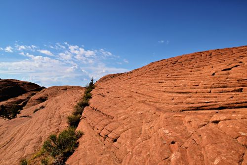 Free Discover the beauty of eroded red rock formations and clear blue skies. Stock Photo
