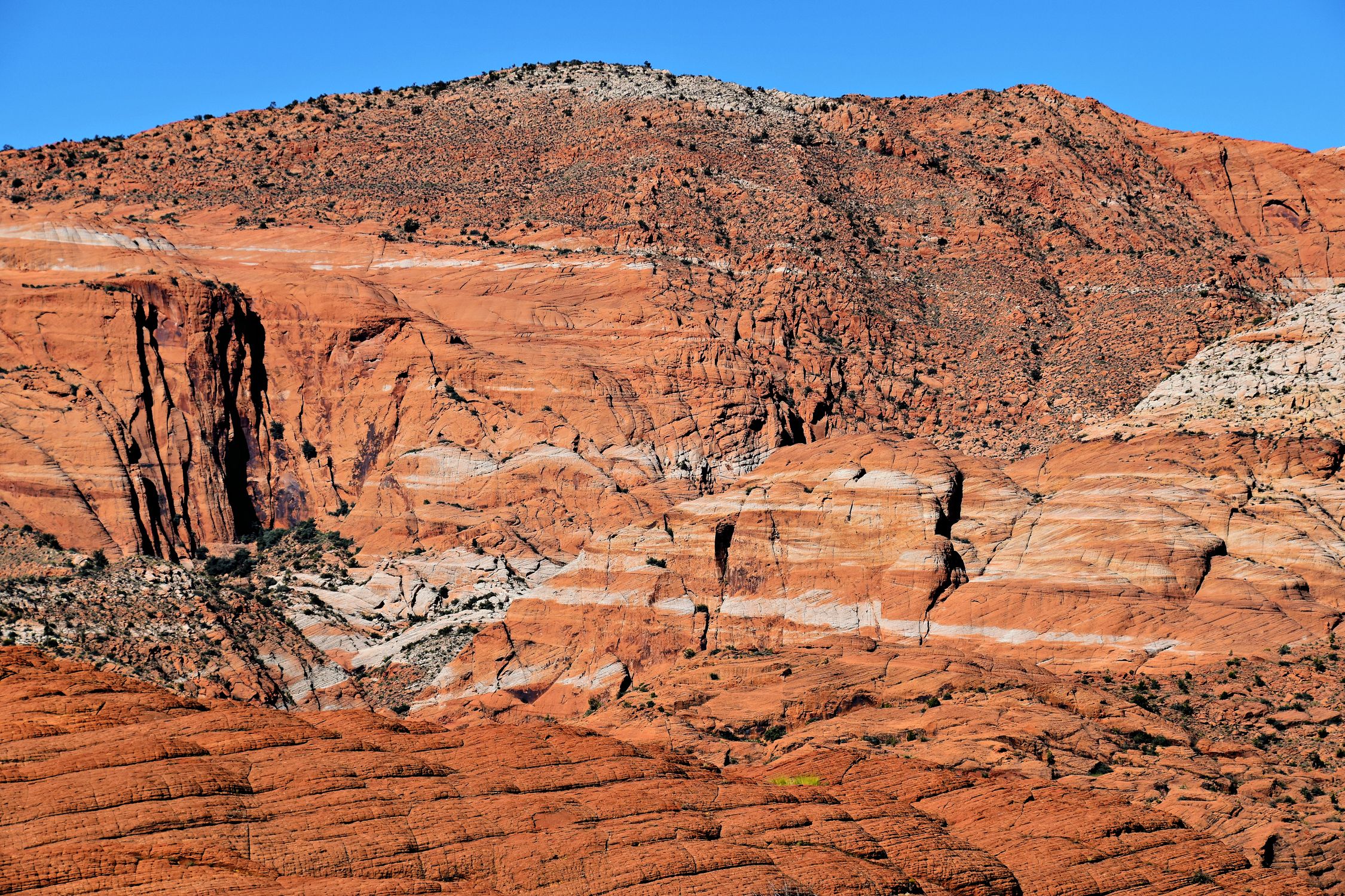 Red Rocks Desert Images A large red rock formation in the desert · Free Stock Photo