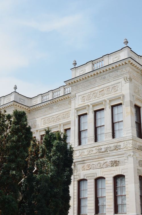 Free Detailed view of the ornate facade of Dolmabahçe Palace in Istanbul, showcasing intricate bas reliefs. Stock Photo
