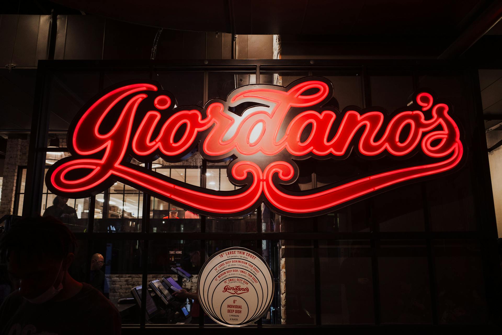 A Red Neon Logo of the Giordanos Pizza Restaurant