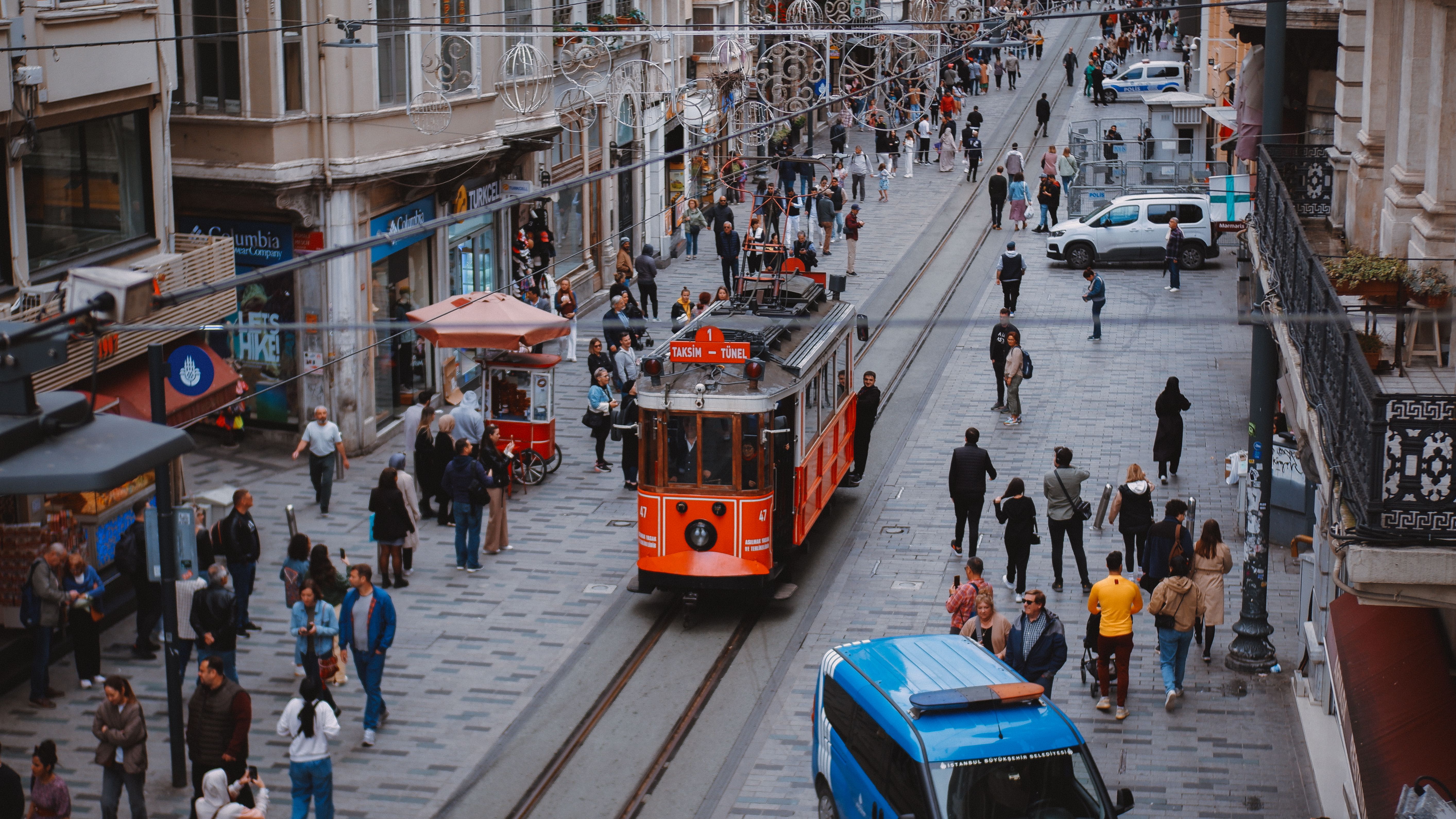 People and Vintage Tram on Cicek Pasaji in Istanbul · Free Stock Photo