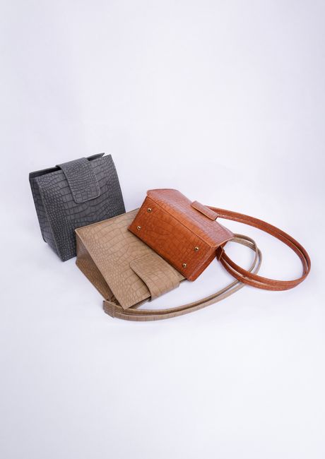 Stylish crocodile pattern handbags in neutral tones on a crisp white background, perfect for fashion showcases. - Recognizing Reliable Online Sellers and Platforms