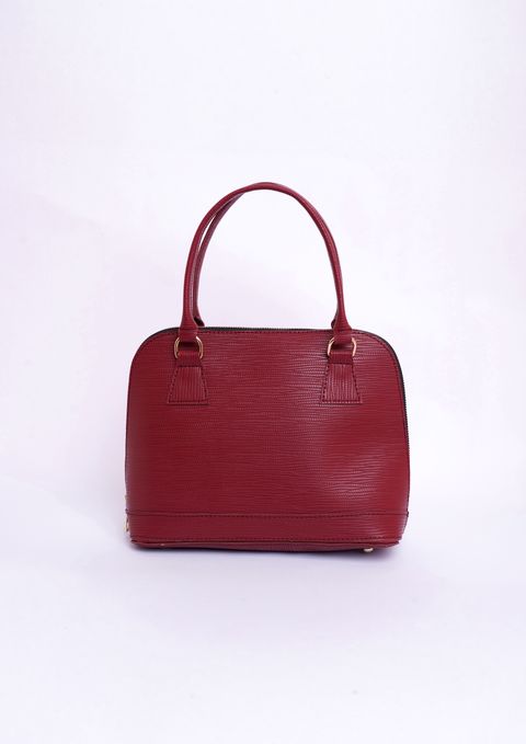 Maroon structured leather handbag on white