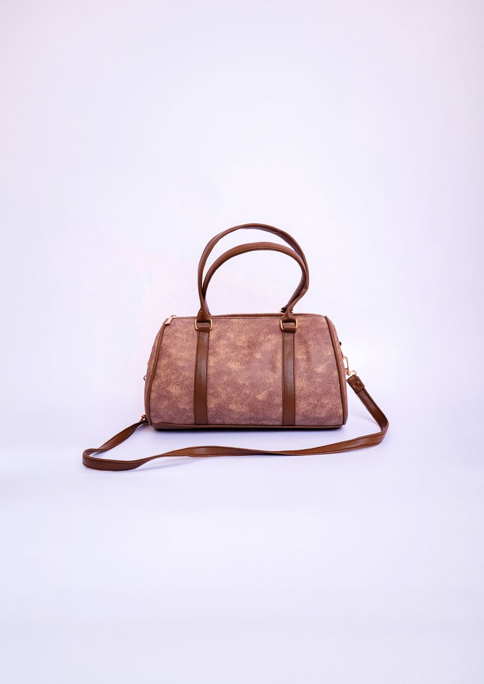 Brown leather handbag on a clean white background