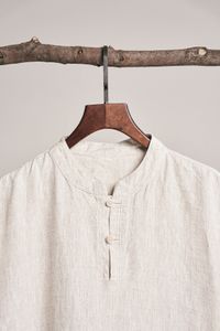 Linen shirt on a hanger, photo by dayong tien on Pexels
