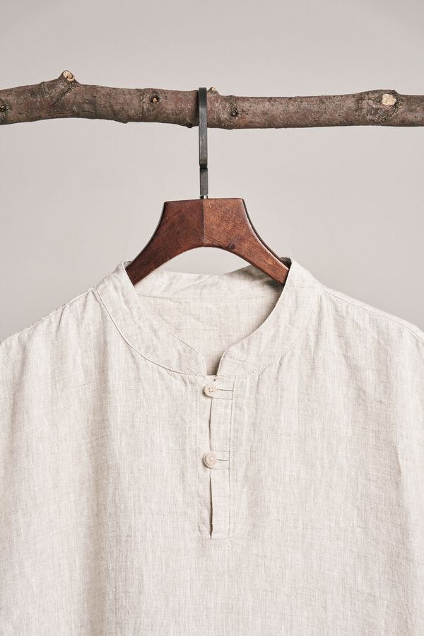 Linen shirt on a hanger, photo by dayong tien on Pexels