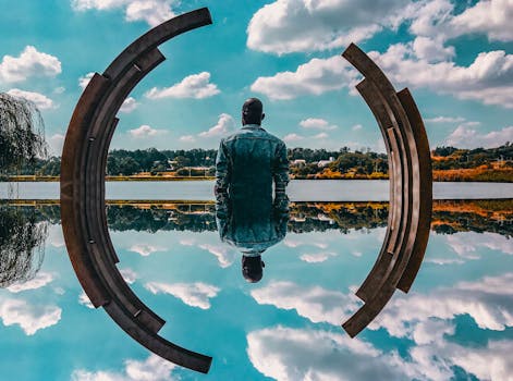 Man Standing Near Body of Water