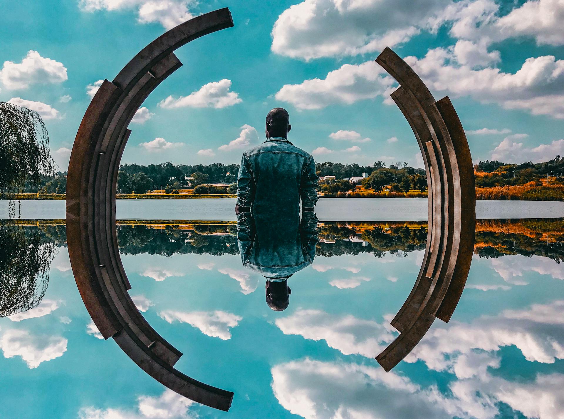 Man Standing Near Body of Water