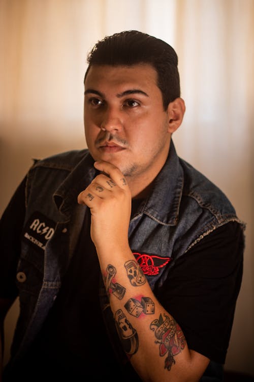 Man Sitting Inside Room