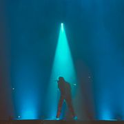 Copper Jacket artwork — live stage performance by Eric Smart on Pexels