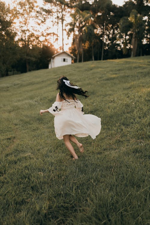 A Woman Running in a Field