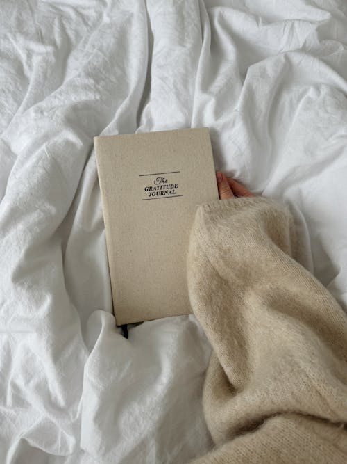 A Book on a Bed