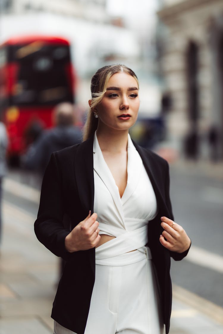 Portrait Of Blonde Woman In Suit Jacket