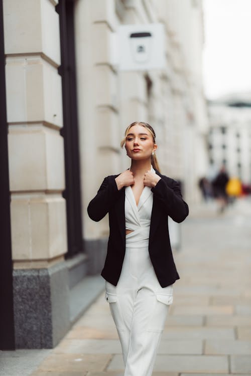 Blonde Woman Walking in Suit Jacket