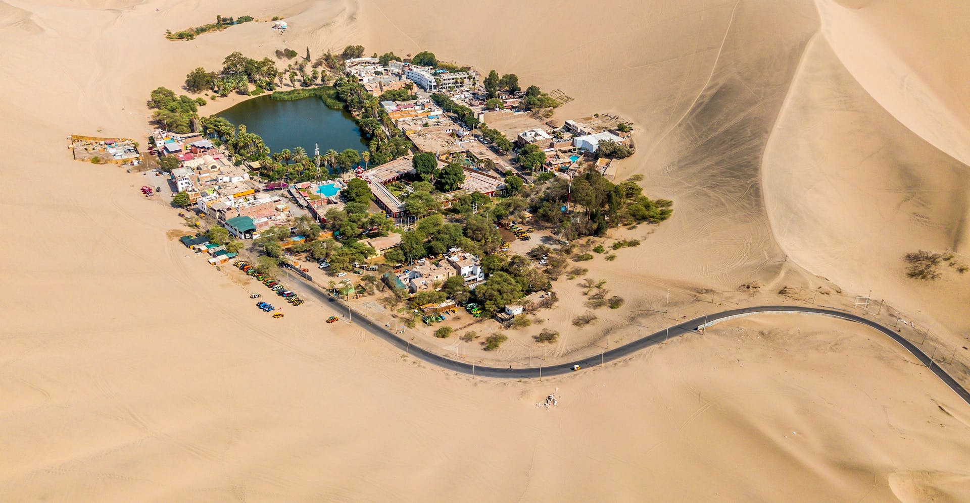 Aerial View of Huacachina Village Around the Desert Oasis