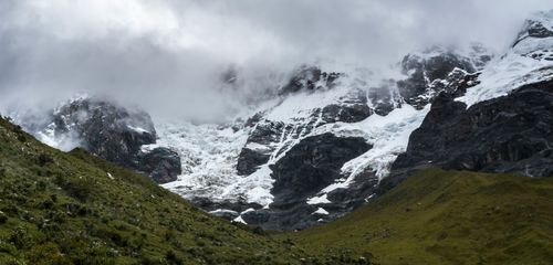 Free Majestic snowcapped Andes mountains with greenery in the Cusco region of Peru. Stock Photo
