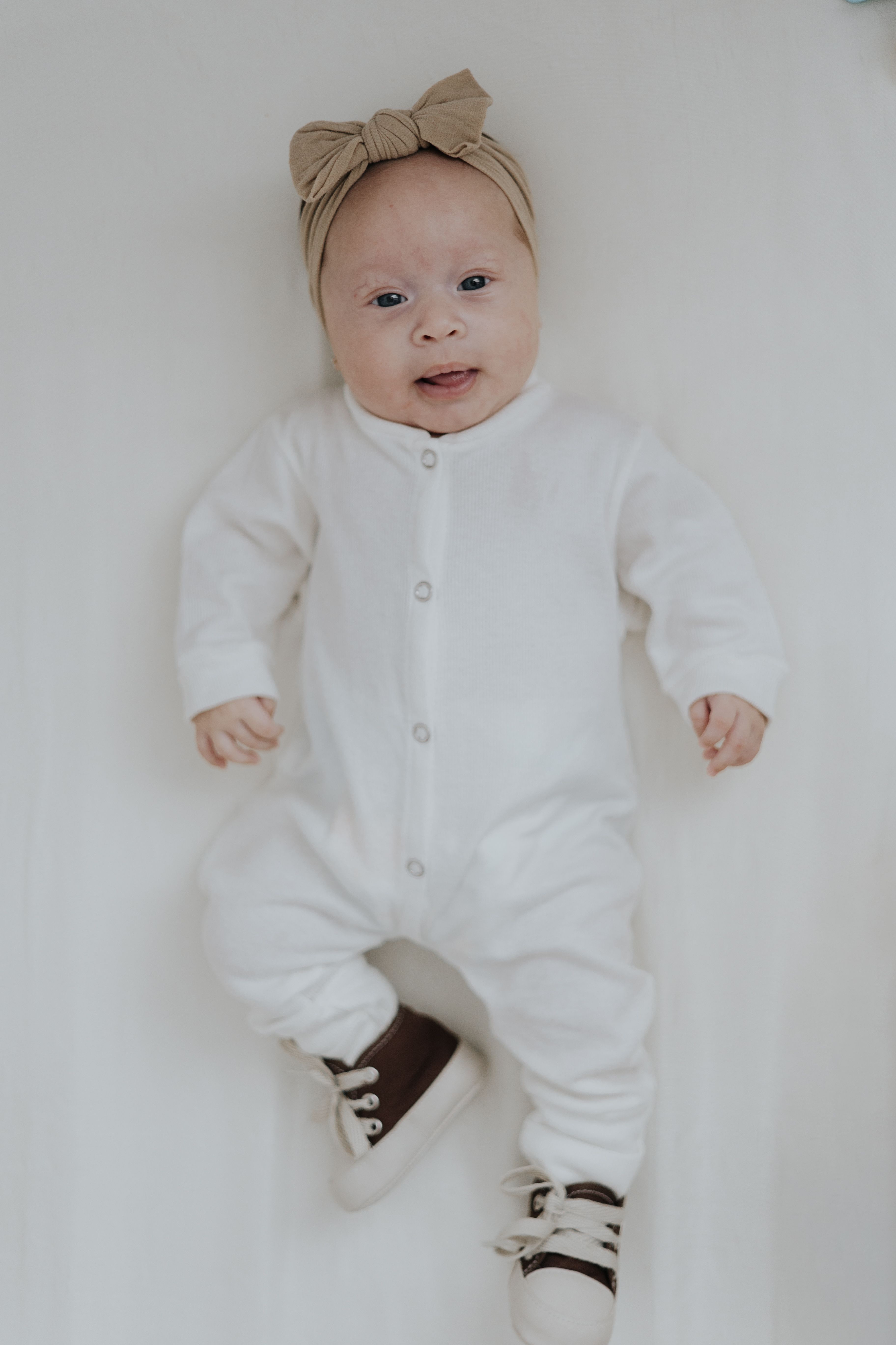 Newborn Baby Wearing Shoes · Free Stock Photo
