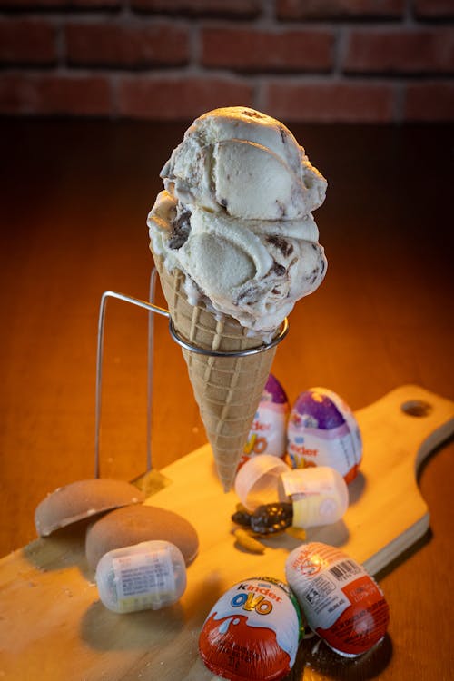A cone of ice cream with eggs and other items