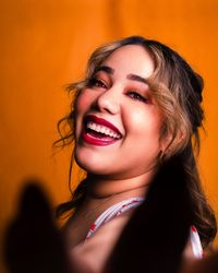 Cheerful portrait in warm light — photo by Oss Leos on Pexels