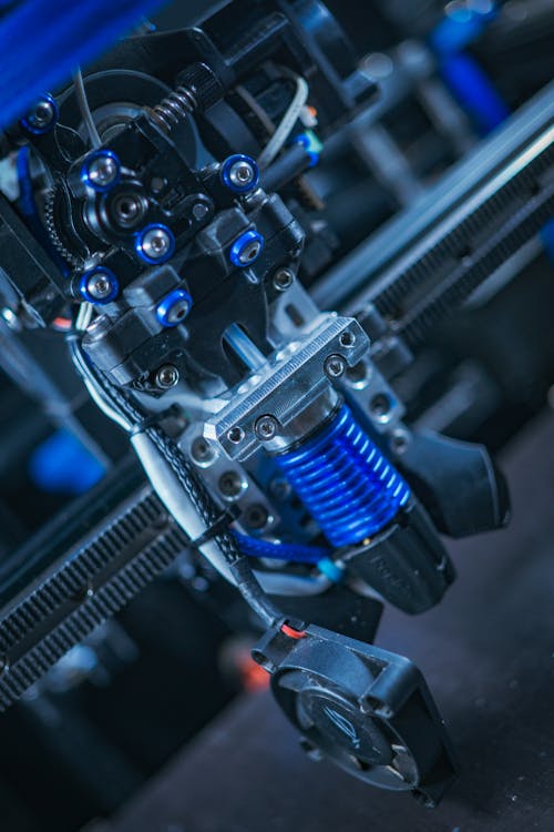 A close up of a machine with blue parts
