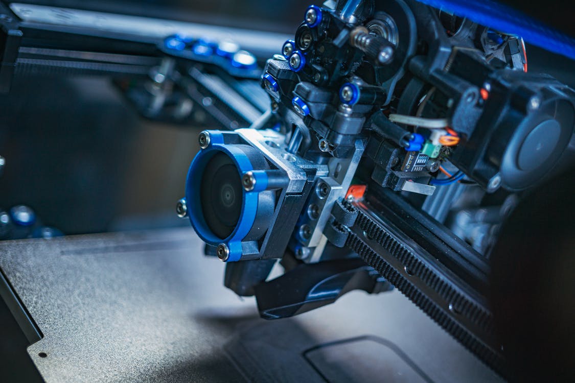A 3d printer is being used to make a part