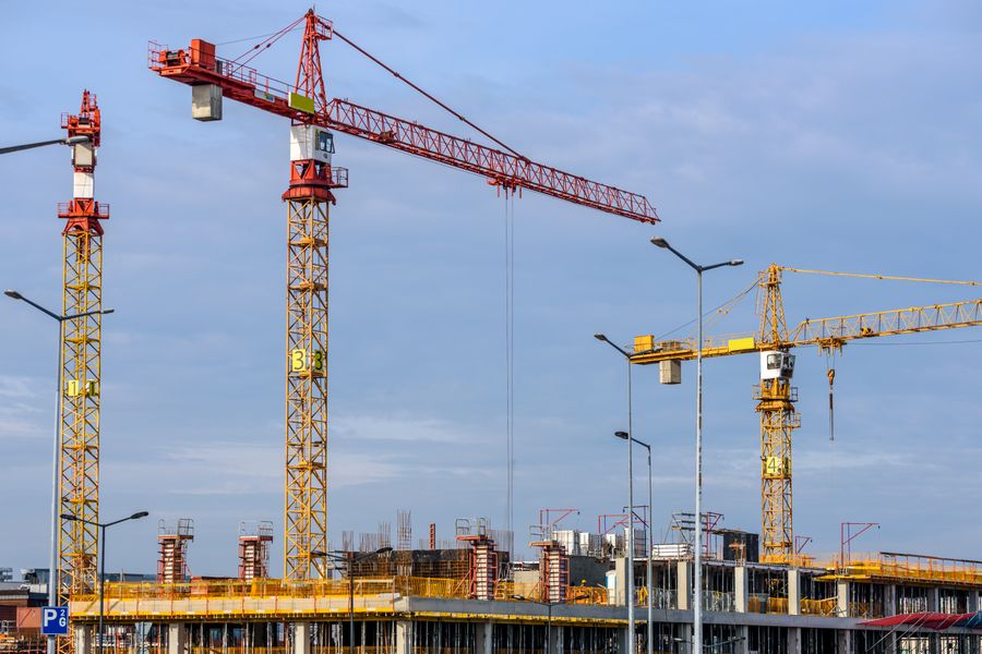 Southbank Apartments — tower cranes over a concrete frame
