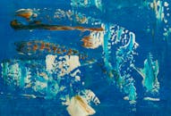 这幅生动的抽象画上，蓝色与橙色的画笔充满活力