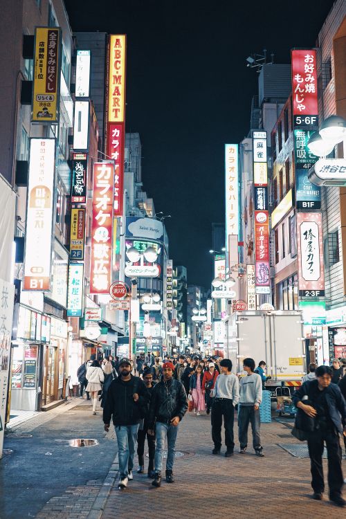 Free Explore Shibuya's illuminated streets and bustling nightlife in Tokyo, Japan's urban heart. Stock Photo
