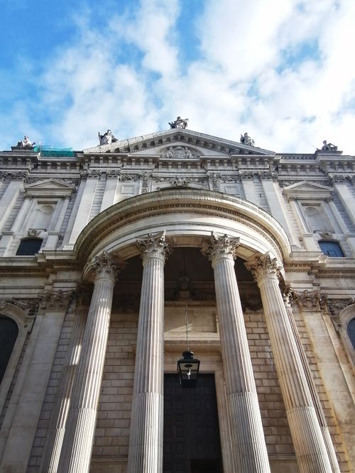 Free Low angle view of the facade of St. Paul's Cathedral in London, featuring classic columns. Stock Photo