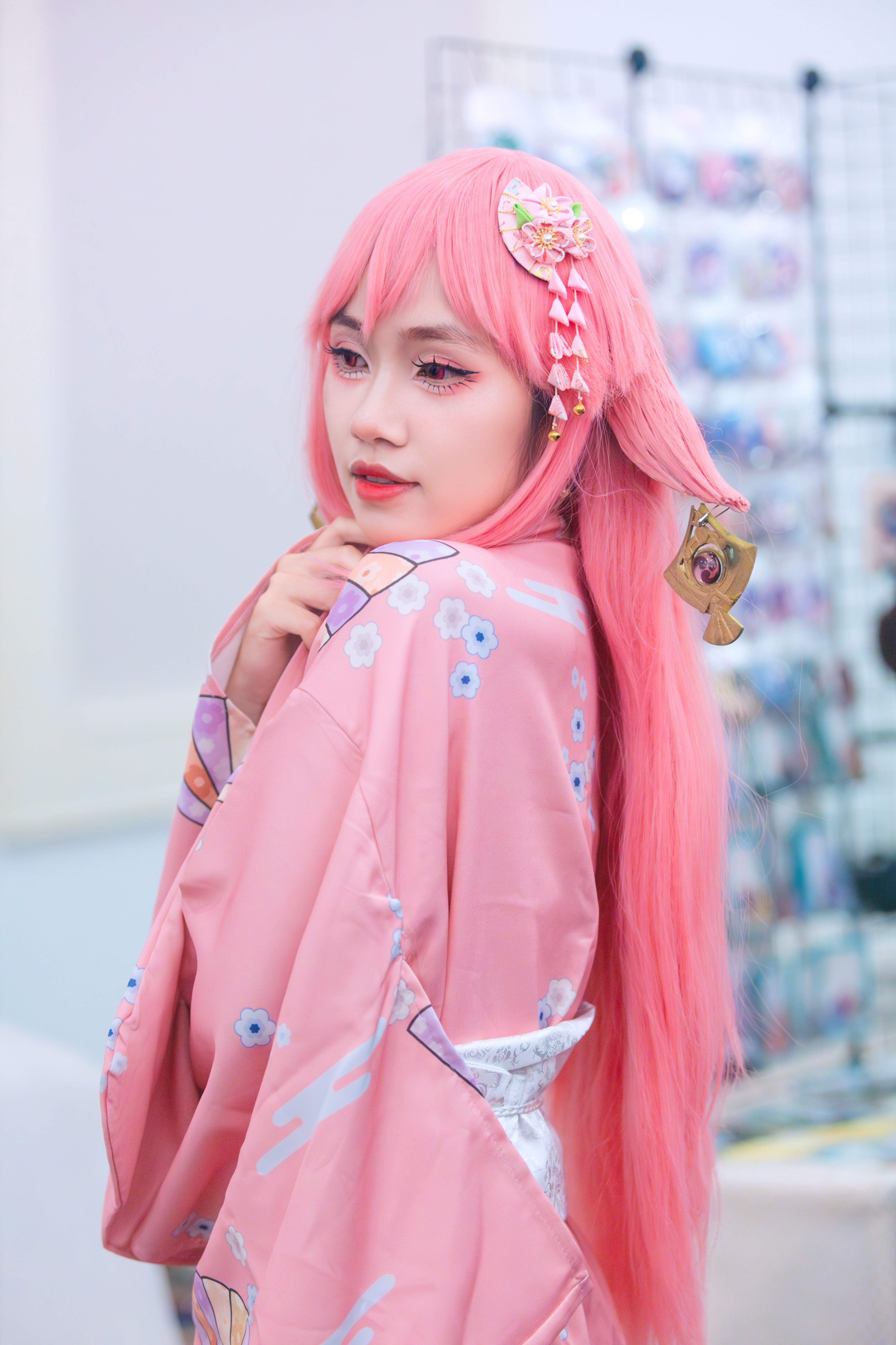 Woman Posing in a Pink Anime Costume · Free Stock Photo