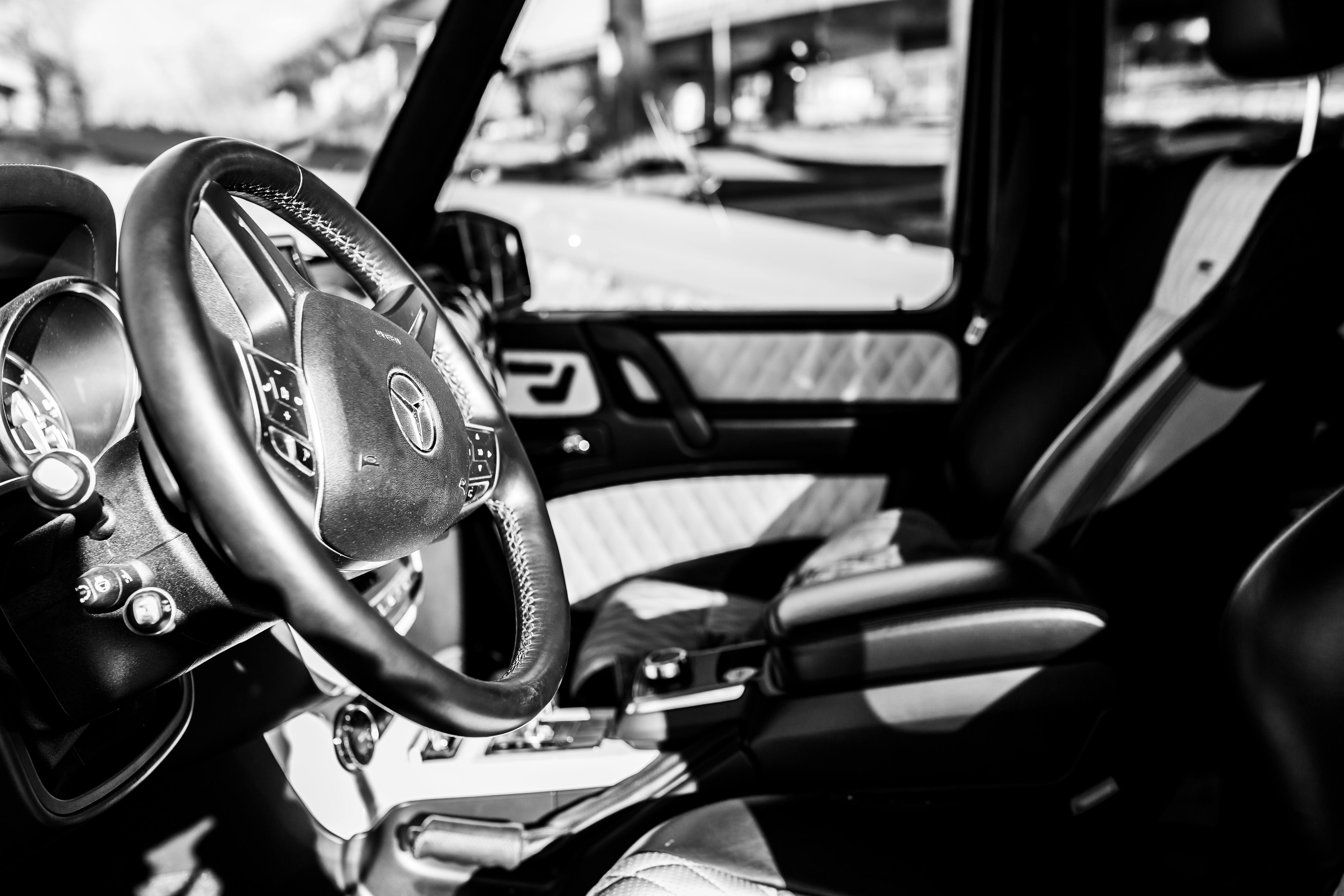 Grayscale Photography of Vehicle Interior