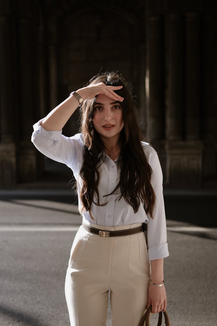 Portrait Of A Brunette In A City