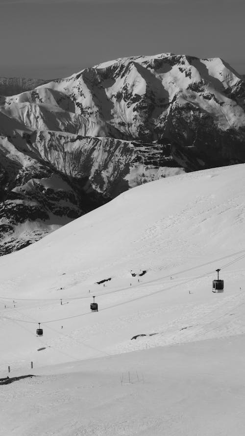 A black and white photo of a ski slope